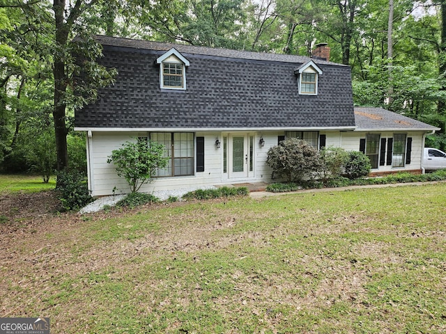 5 Red Fox Dr SW, Rome, GA 30165 - colonial inspired home featuring a chimney, a shingled roof, and a front lawn
