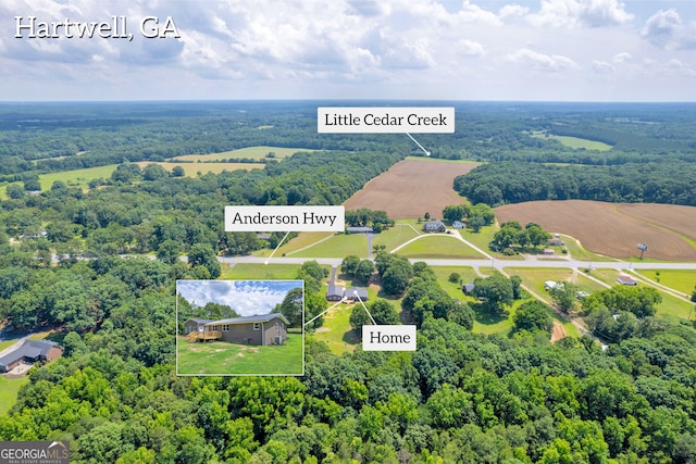 3689 Anderson Hwy, Hartwell, GA 30643 - aerial view of property and surrounding area with property boundaries highlighted and a heavily wooded area