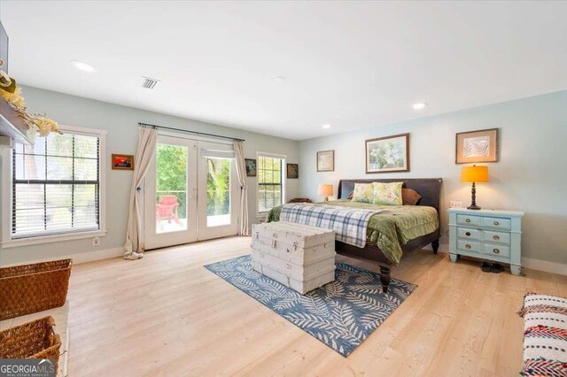 103 Ashley Marsh Dr, Brunswick, GA 31523 - bedroom with access to exterior, multiple windows, light wood-style floors, and recessed lighting