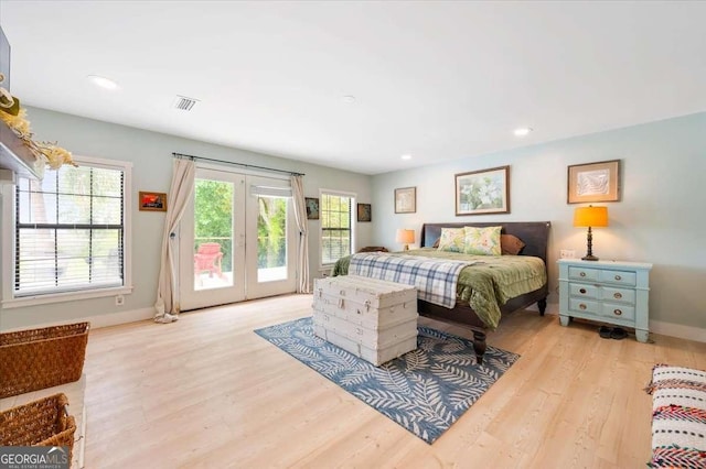 103 Ashley Marsh Dr, Brunswick, GA 31523 - bedroom featuring access to outside, multiple windows, light wood-style floors, baseboards, and recessed lighting