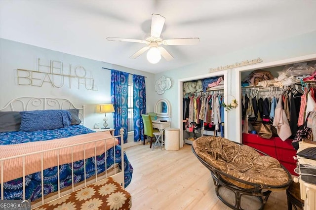 103 Ashley Marsh Dr, Brunswick, GA 31523 - bedroom with multiple closets, wood finished floors, and a ceiling fan
