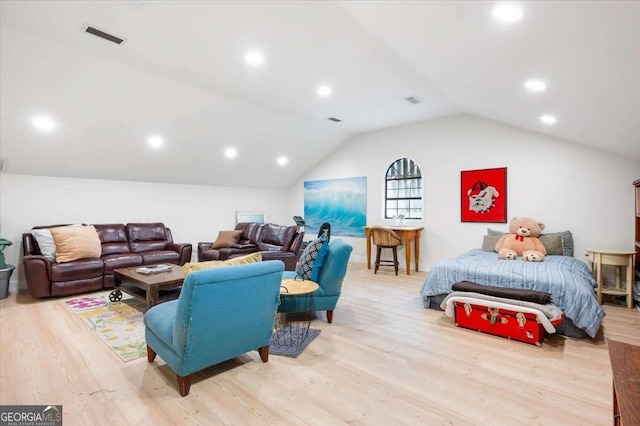 103 Ashley Marsh Dr, Brunswick, GA 31523 - living room featuring wood finished floors, vaulted ceiling, and recessed lighting