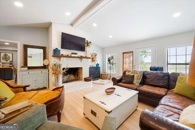 103 Ashley Marsh Dr, Brunswick, GA 31523 - living area featuring light wood finished floors, healthy amount of natural light, a brick fireplace, and recessed lighting