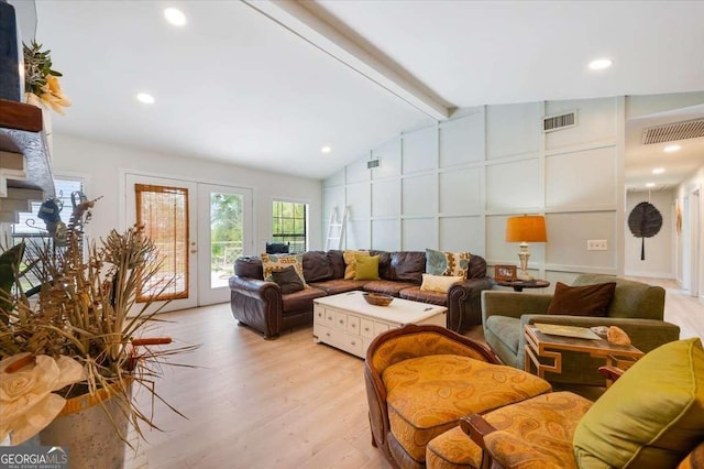 103 Ashley Marsh Dr, Brunswick, GA 31523 - living room featuring light wood-style floors, a decorative wall, and recessed lighting