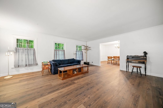 286 Hilton Way, Canton, GA 30114 - living area with wood finished floors, a chandelier, and ornamental molding