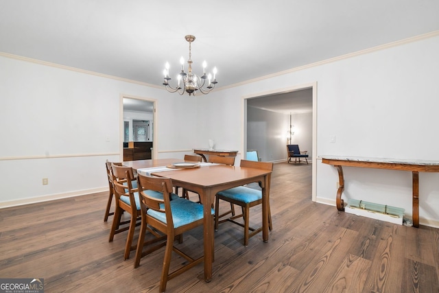 286 Hilton Way, Canton, GA 30114 - dining area featuring a chandelier, ornamental molding, and dark wood-style floors