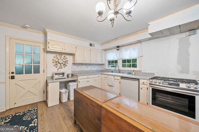 286 Hilton Way, Canton, GA 30114 - kitchen featuring dishwashing machine, stainless steel range with gas stovetop, light wood-type flooring, a chandelier, and crown molding
