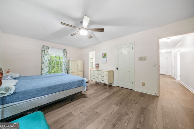 286 Hilton Way, Canton, GA 30114 - bedroom with attic access, wood finished floors, and ceiling fan