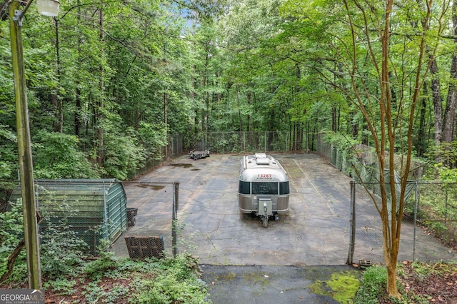 286 Hilton Way, Canton, GA 30114 - view of patio featuring a forest view