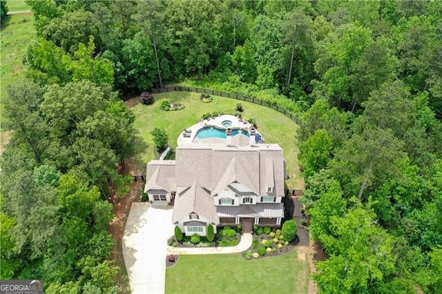126 Townsend Pass, Alpharetta, GA 30004 - aerial view of property and surrounding area featuring a heavily wooded area and a pool area