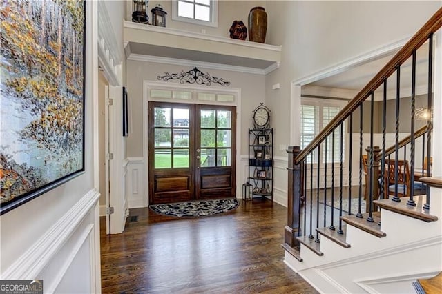 126 Townsend Pass, Alpharetta, GA 30004 - foyer entrance featuring stairs, plenty of natural light, crown molding, a decorative wall, and a wainscoted wall
