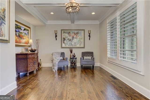126 Townsend Pass, Alpharetta, GA 30004 - living area with crown molding, wood finished floors, beamed ceiling, a chandelier, and recessed lighting