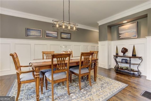 126 Townsend Pass, Alpharetta, GA 30004 - dining room with a decorative wall, ornamental molding, wainscoting, and dark wood-style floors