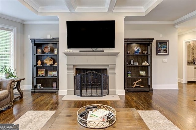 126 Townsend Pass, Alpharetta, GA 30004 - living area featuring wood finished floors, a fireplace with raised hearth, and crown molding