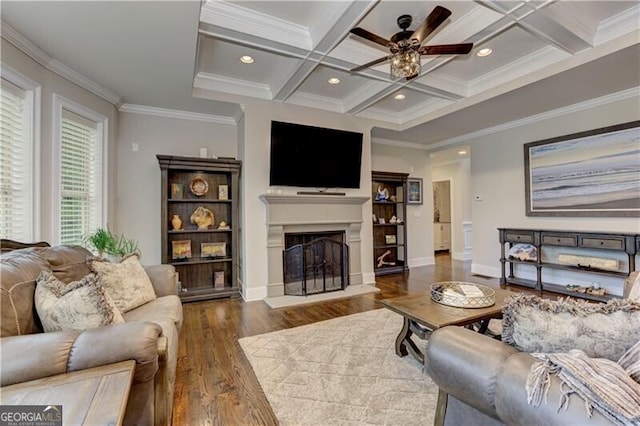 126 Townsend Pass, Alpharetta, GA 30004 - living area with ceiling fan, a fireplace with raised hearth, wood finished floors, ornamental molding, and coffered ceiling