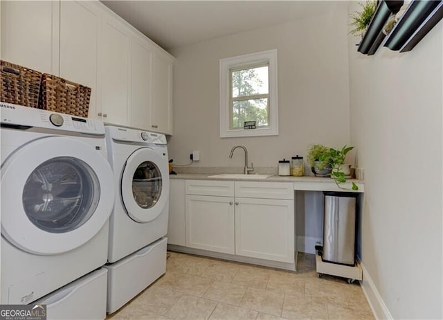 126 Townsend Pass, Alpharetta, GA 30004 - laundry area featuring washer and dryer and cabinet space