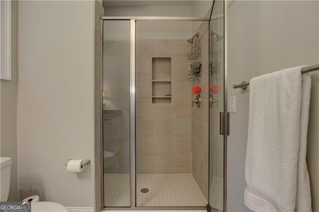 126 Townsend Pass, Alpharetta, GA 30004 - bathroom featuring toilet and a stall shower