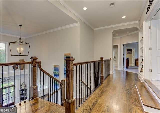 126 Townsend Pass, Alpharetta, GA 30004 - hall featuring a chandelier, an upstairs landing, wood finished floors, crown molding, and recessed lighting