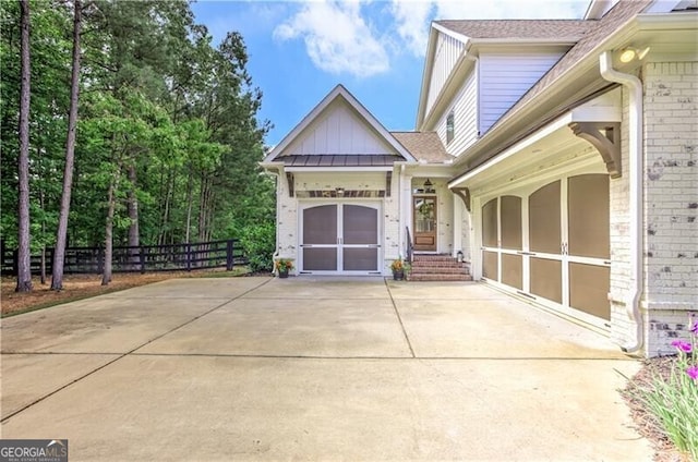 126 Townsend Pass, Alpharetta, GA 30004 - view of property exterior with brick siding, board and batten siding, and a shingled roof