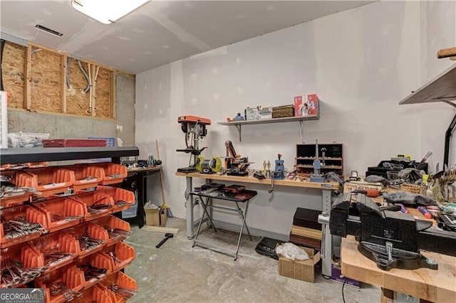 126 Townsend Pass, Alpharetta, GA 30004 - miscellaneous room featuring a workshop area and unfinished concrete flooring