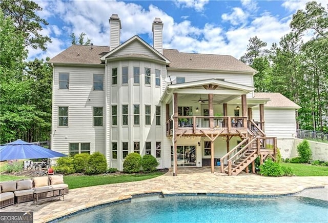 126 Townsend Pass, Alpharetta, GA 30004 - rear view of property featuring ceiling fan, stairs, a patio, a chimney, and a wooden deck
