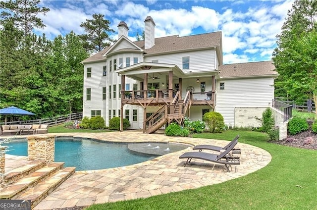 126 Townsend Pass, Alpharetta, GA 30004 - back of property featuring stairway, a ceiling fan, a wooden deck, a chimney, and a patio
