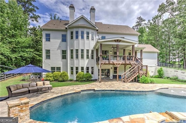 126 Townsend Pass, Alpharetta, GA 30004 - rear view of house featuring stairs, a ceiling fan, a wooden deck, a patio area, and a chimney