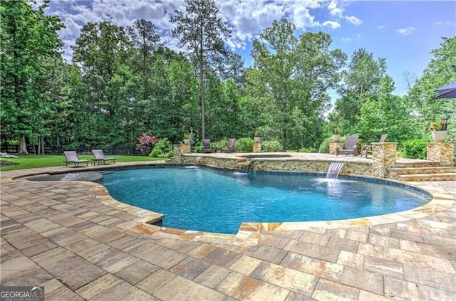 126 Townsend Pass, Alpharetta, GA 30004 - view of swimming pool featuring a patio area and a pool with connected hot tub