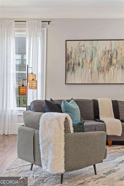 3834 Chamblee Dunwoody Rd, Atlanta, GA 30341 - living area featuring ornamental molding and wood finished floors