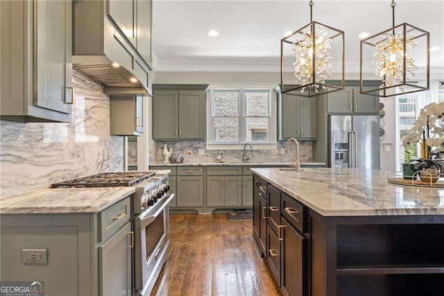 3834 Chamblee Dunwoody Rd, Atlanta, GA 30341 - kitchen featuring high end appliances, light stone countertops, crown molding, decorative backsplash, and recessed lighting
