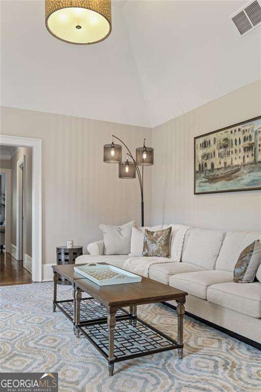 3834 Chamblee Dunwoody Rd, Atlanta, GA 30341 - living area with lofted ceiling and wood finished floors
