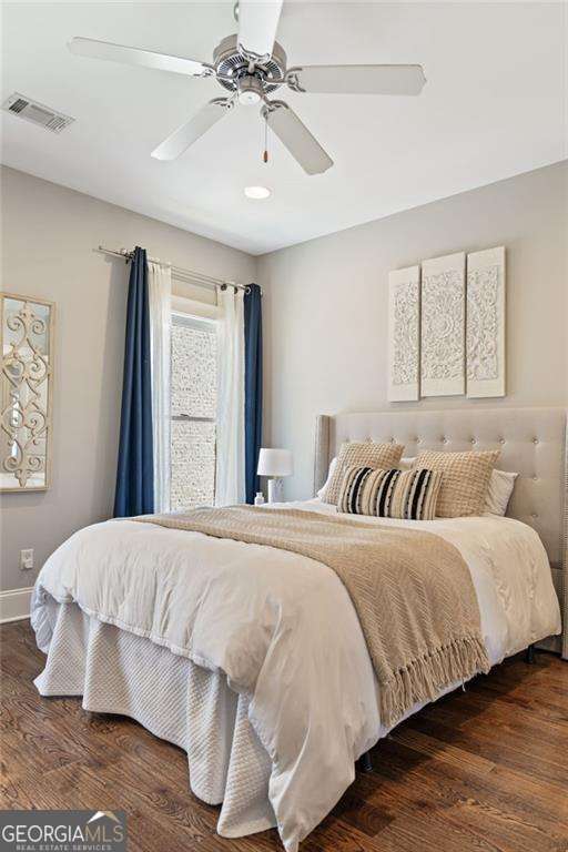 3834 Chamblee Dunwoody Rd, Atlanta, GA 30341 - bedroom with wood finished floors and ceiling fan