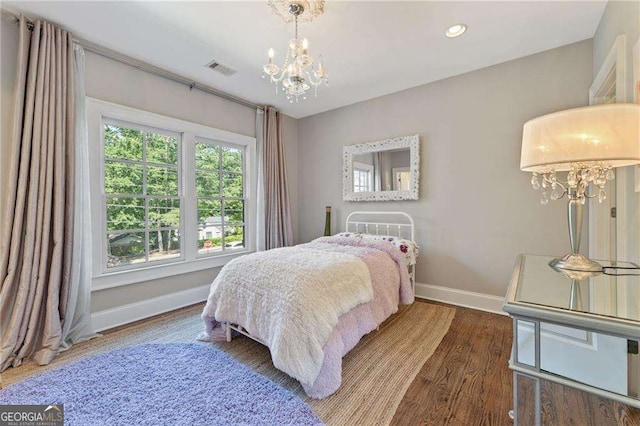 3834 Chamblee Dunwoody Rd, Atlanta, GA 30341 - bedroom with a chandelier, wood finished floors, and recessed lighting