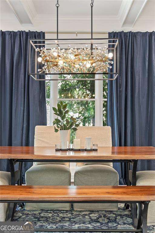 3834 Chamblee Dunwoody Rd, Atlanta, GA 30341 - dining area featuring a chandelier and crown molding