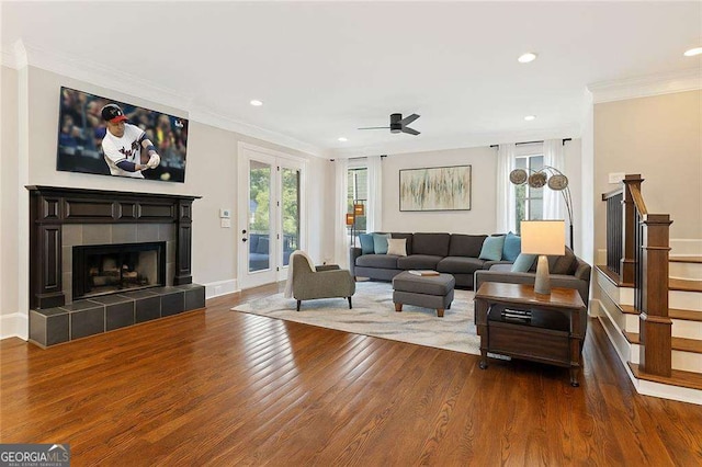 3834 Chamblee Dunwoody Rd, Atlanta, GA 30341 - living area featuring wood finished floors, ornamental molding, recessed lighting, ceiling fan, and stairs