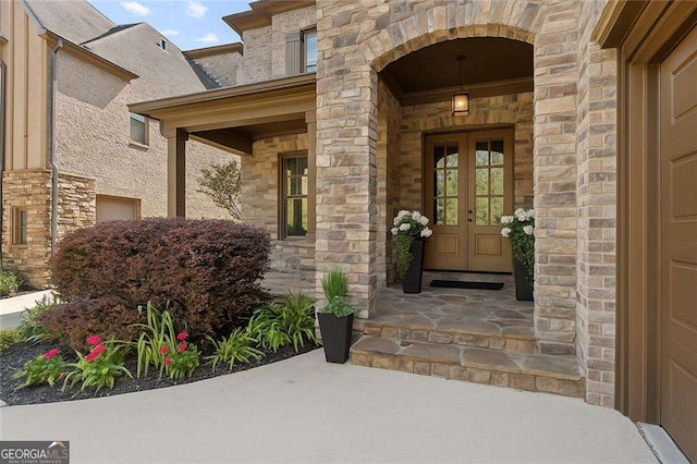 3834 Chamblee Dunwoody Rd, Atlanta, GA 30341 - view of exterior entry featuring stone siding and french doors