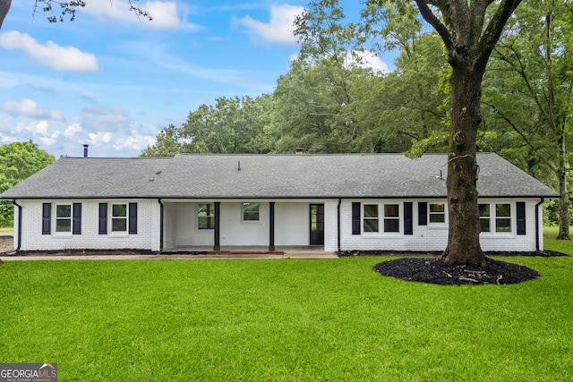 1180 Treadwell Bridge Rd, Statham, GA 30666 - ranch-style home featuring roof with shingles, a front yard, and brick siding