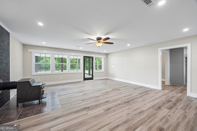 1180 Treadwell Bridge Rd, Statham, GA 30666 - living area with a ceiling fan, plenty of natural light, wood finished floors, and recessed lighting