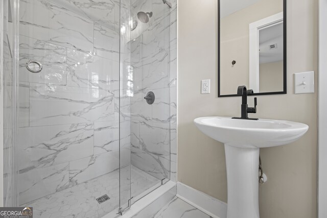 1180 Treadwell Bridge Rd, Statham, GA 30666 - full bath with a marble finish shower and marble look tiles