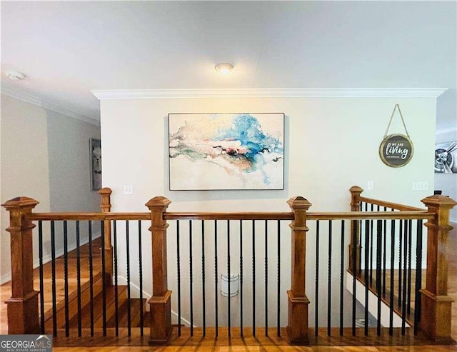 345 Etheridge Rd, Auburn, GA 30011 - hall with an upstairs landing, ornamental molding, and wood finished floors