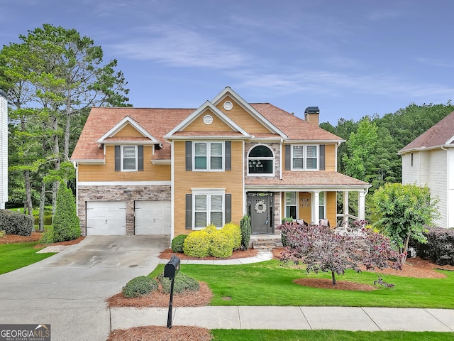 1346 Wind Chime Ct, Lawrenceville, GA 30045 - view of front of property with concrete driveway, a chimney, a garage, a front yard, and stone siding