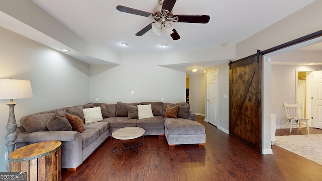 1346 Wind Chime Ct, Lawrenceville, GA 30045 - living area with wood finished floors, a barn door, a ceiling fan, recessed lighting, and baseboards