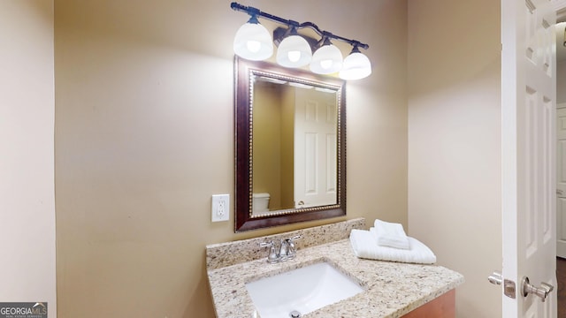 1346 Wind Chime Ct, Lawrenceville, GA 30045 - bathroom featuring toilet and vanity