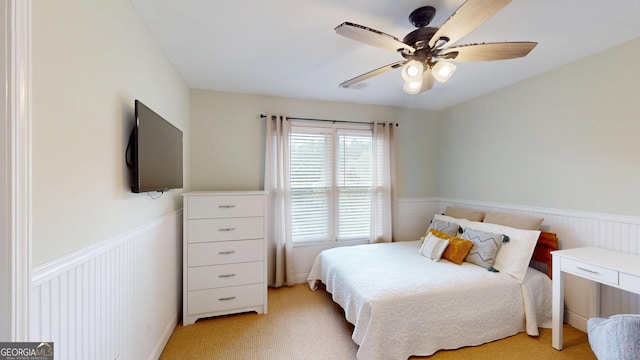 1346 Wind Chime Ct, Lawrenceville, GA 30045 - bedroom featuring a wainscoted wall, light carpet, and ceiling fan