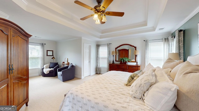 1346 Wind Chime Ct, Lawrenceville, GA 30045 - bedroom featuring a raised ceiling, light colored carpet, ornamental molding, ceiling fan, and baseboards