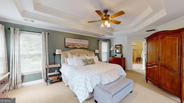 1346 Wind Chime Ct, Lawrenceville, GA 30045 - bedroom with a tray ceiling, ornamental molding, light carpet, baseboards, and a ceiling fan