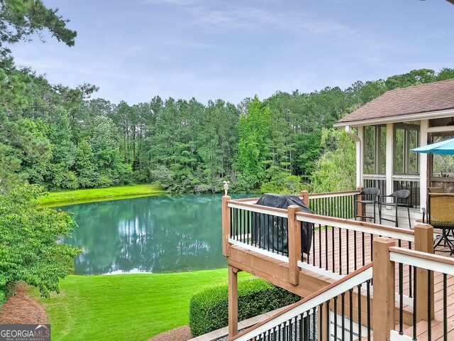 1346 Wind Chime Ct, Lawrenceville, GA 30045 - deck featuring a water view, a view of trees, and a yard