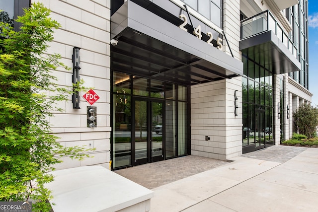 2425 Peachtree Rd NE Unit 902, Atlanta, GA 30305 - view of exterior entry featuring french doors