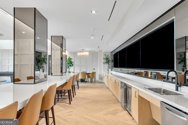 2425 Peachtree Rd NE Unit 902, Atlanta, GA 30305 - kitchen with modern cabinets, dishwasher, light countertops, recessed lighting, and wine cooler