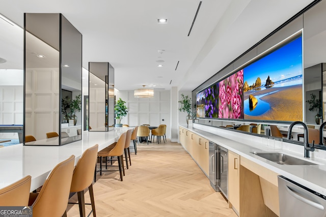 2425 Peachtree Rd NE Unit 902, Atlanta, GA 30305 - kitchen with modern cabinets, dishwasher, light countertops, recessed lighting, and wine cooler